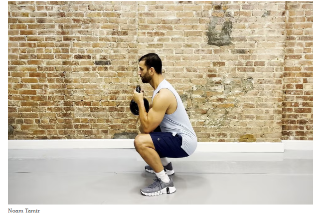Example of a goblet squat for gym beginners