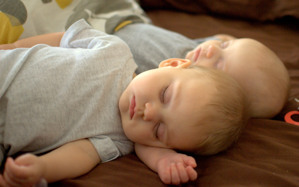 Image of two babies sleeping.