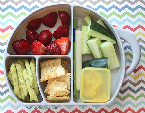Image of a snack bowl with a variety of healthy options.