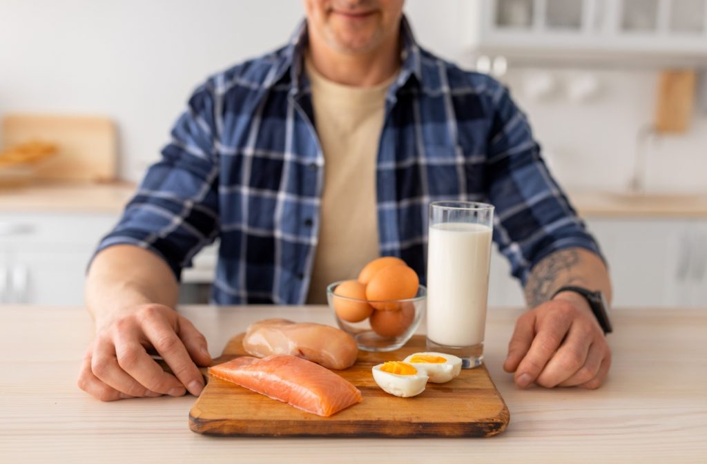 older man eating meats